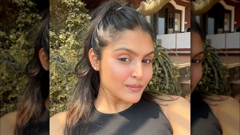 Woman wearing lengthening mascara