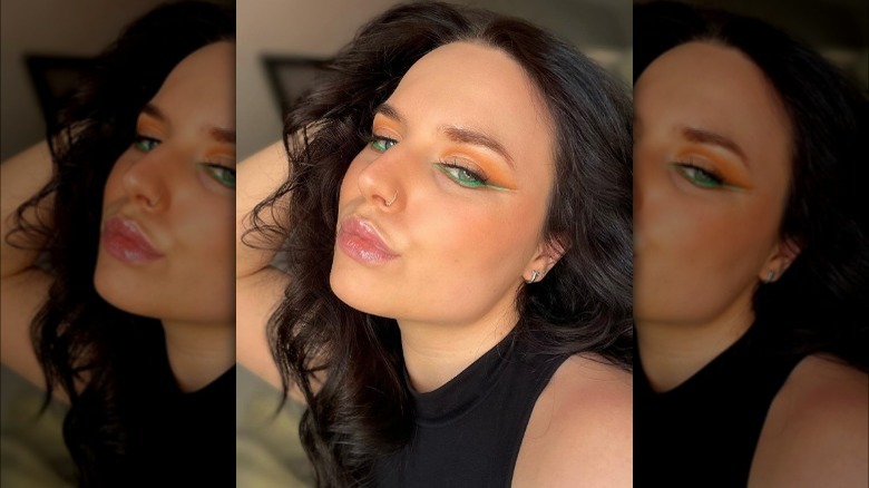 woman with neon green underliner