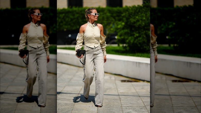 Woman in halter vest with collar