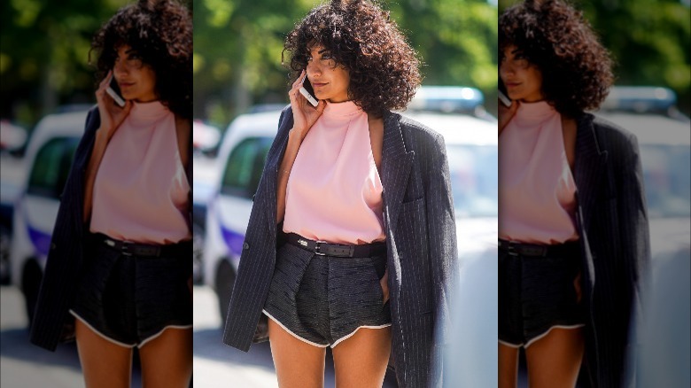 Woman in high-collared halter