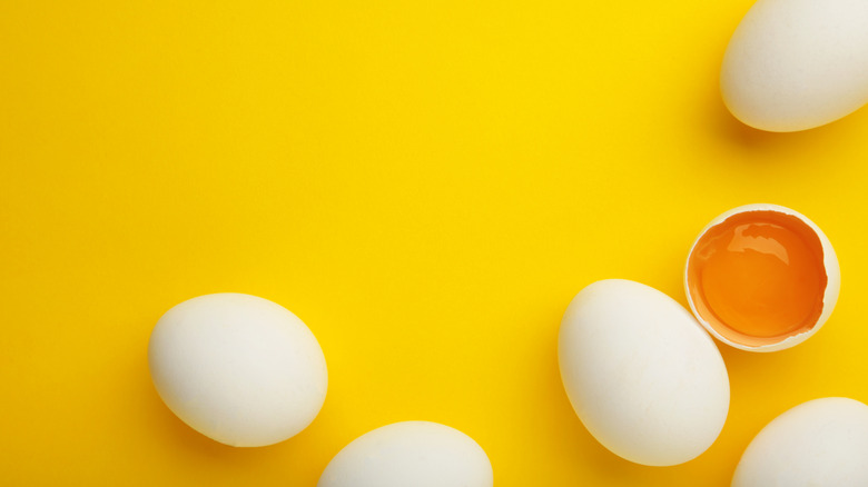 Eggs on yellow background