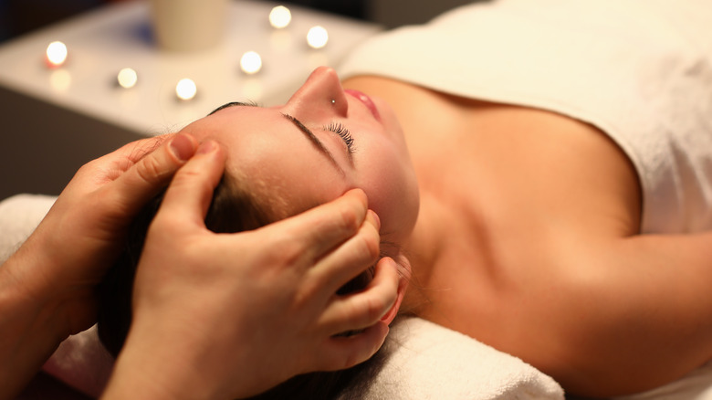 woman getting a facial massage 