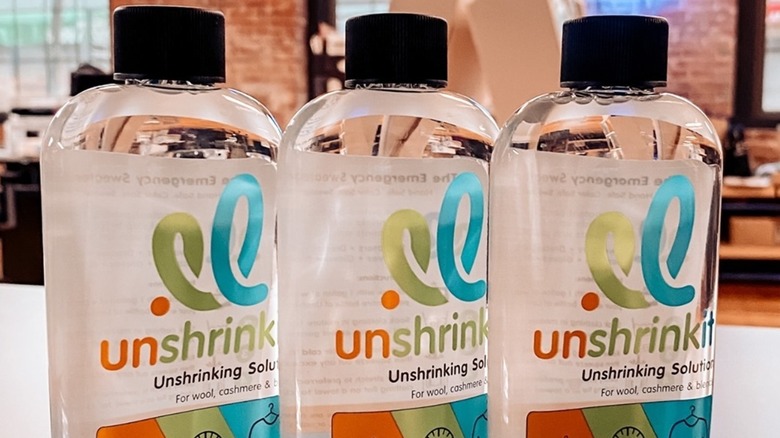 Three bottles of Unshrinkit