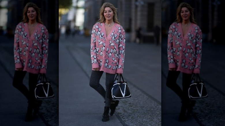 Bold cardigan with gray leggings