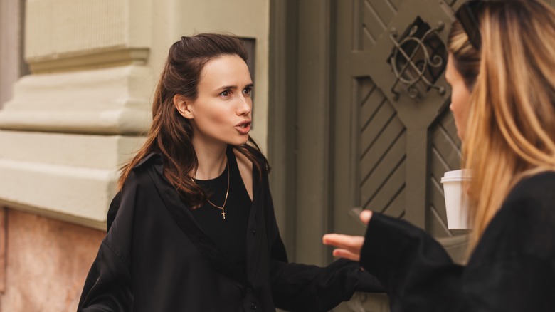 Woman argues with family member 