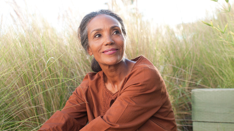 Woman sitting in a field