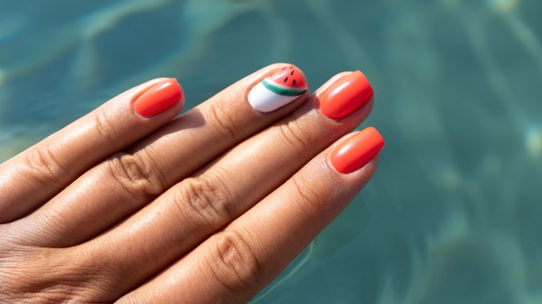 Painted nails over water