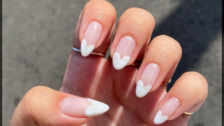 Heart-shaped French tip manicure