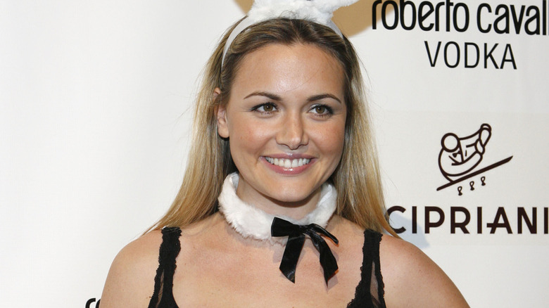 Vanessa Trump with Playboy bunny ears and a collar on the red carpet
