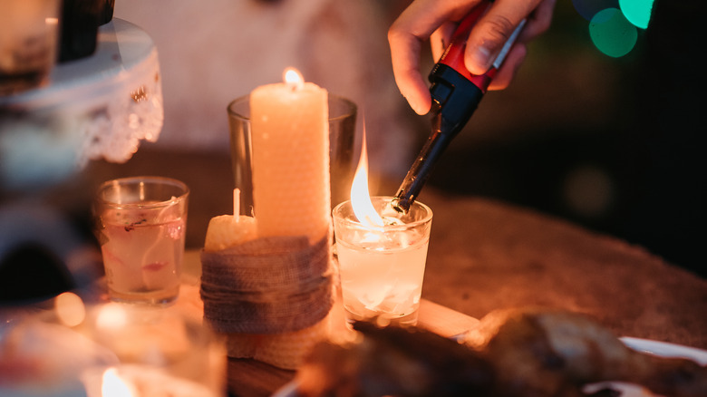 Lighting candle cozy scene