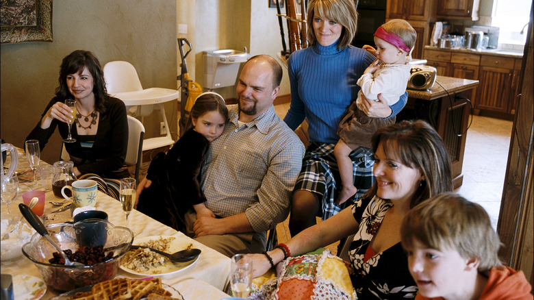 Polygamist family eating dinner together
