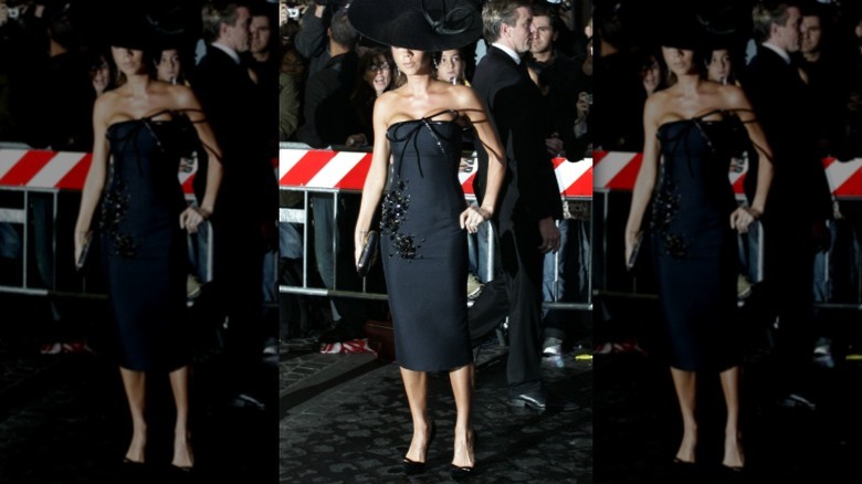 Victoria Beckham poses outside Tom Cruise and Katie Holmes' wedding ceremony