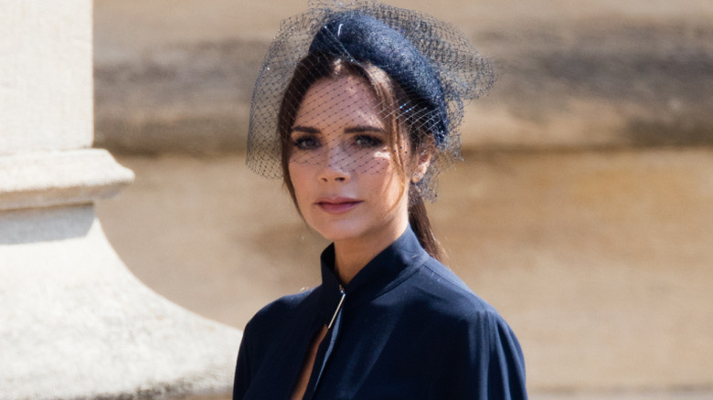 Victoria Beckham walks in at Prince Harry and Meghan Markle's wedding