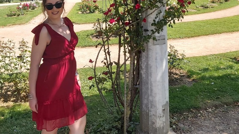 woman wearing red sleeveless dress
