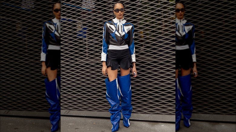 woman wearing blue wader boots