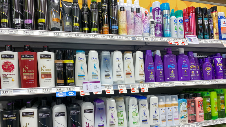 woman applying hair gel