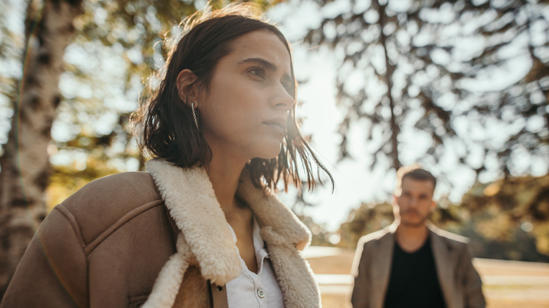 Stressed couple avoiding each other