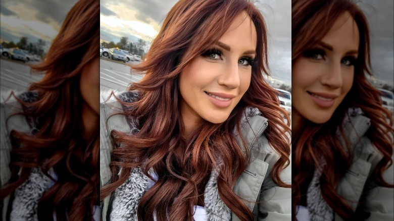 Woman with chestnut colored hair 