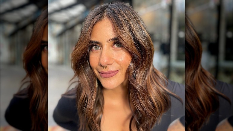 Woman with caramel color hair 