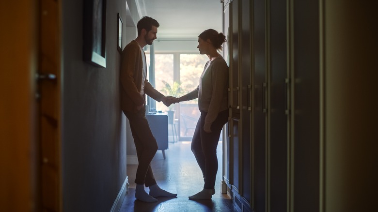 Couple holding hands 