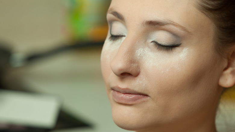 Woman with powder on her face