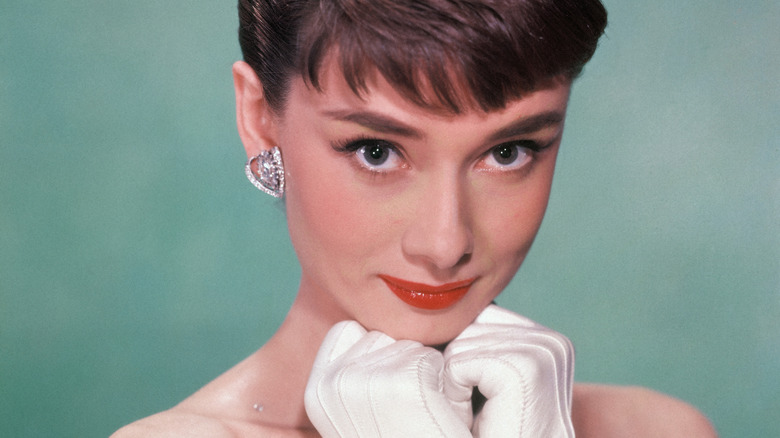Audrey Hepburn with white gloves