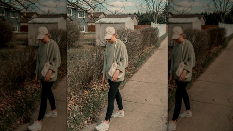 woman in leggings and sneakers