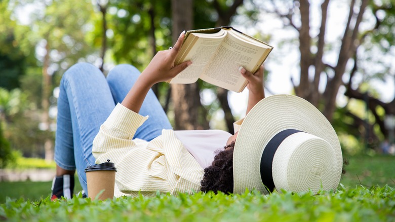 Woman reading outdoors