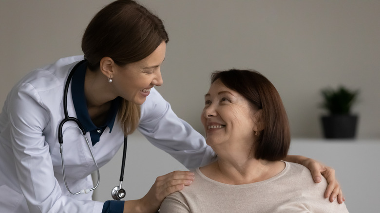 woman talking to doctor