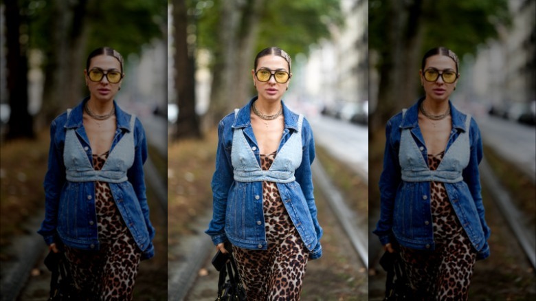 woman wearing denim bra over top 