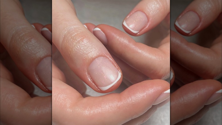 Short French manicure with sparkly polish