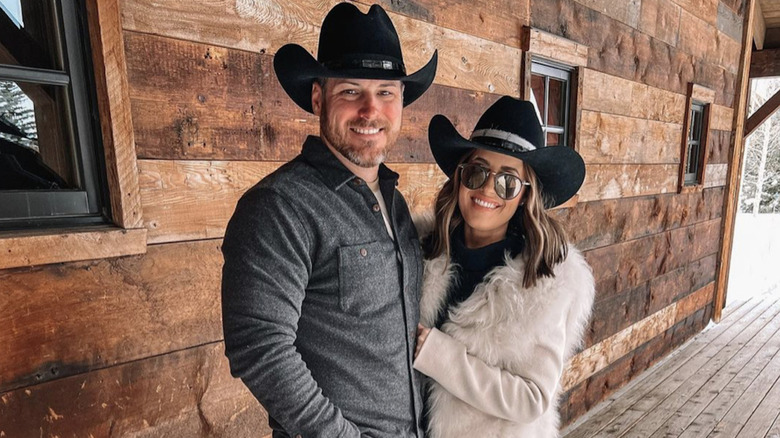 couple wearing cowgirl hats