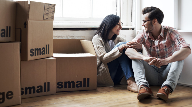 Happy couple after moving