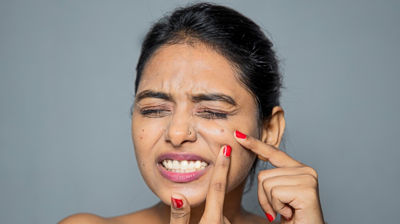 woman with facial inflammation