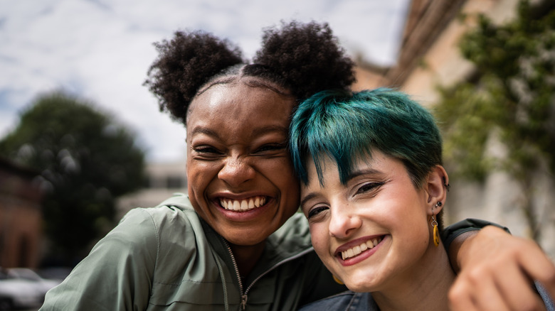 Happy couple hugging and smiling