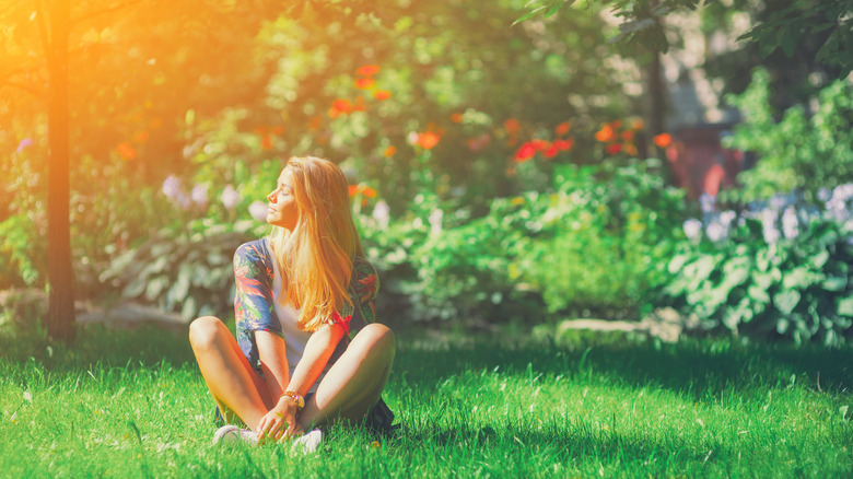 Woman sitting in nature