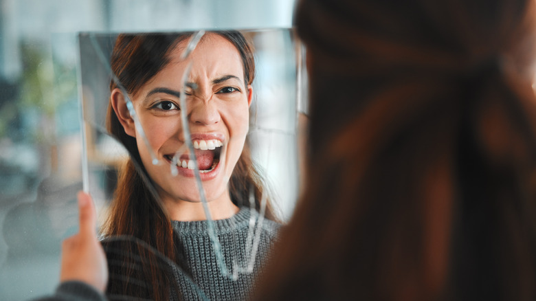 Woman experiencing conflicting emotions