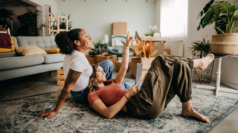 Lesbian couple in their living room