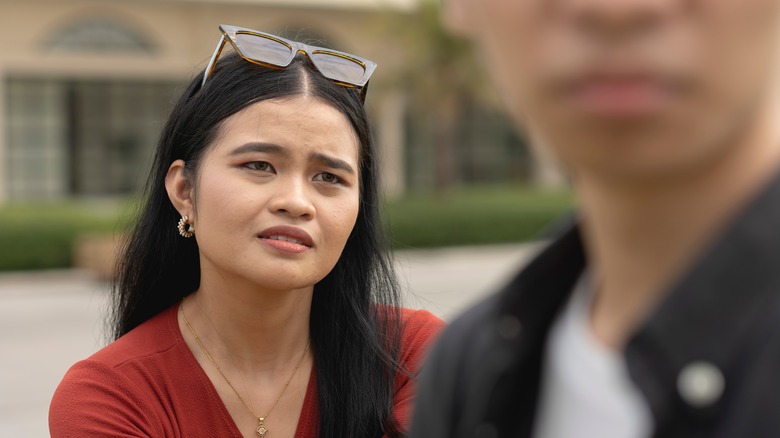 man turning away from woman