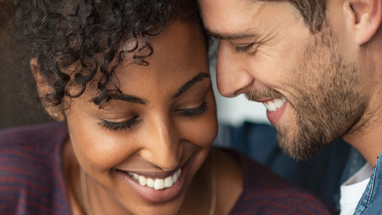 happy couple cuddling