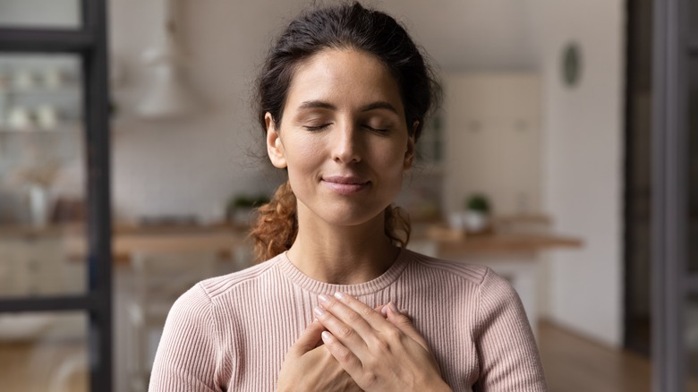 Peaceful woman smiling