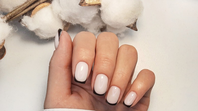 Black French tip manicure