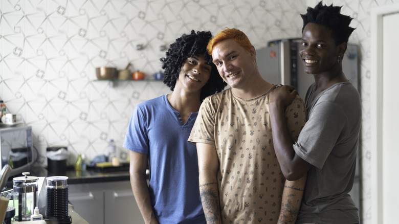 polyamorous people standing together