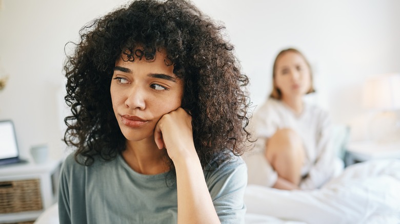 unhappy couple in bedroom