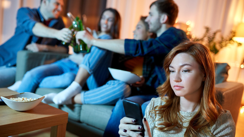 Unsatisfied woman using social media