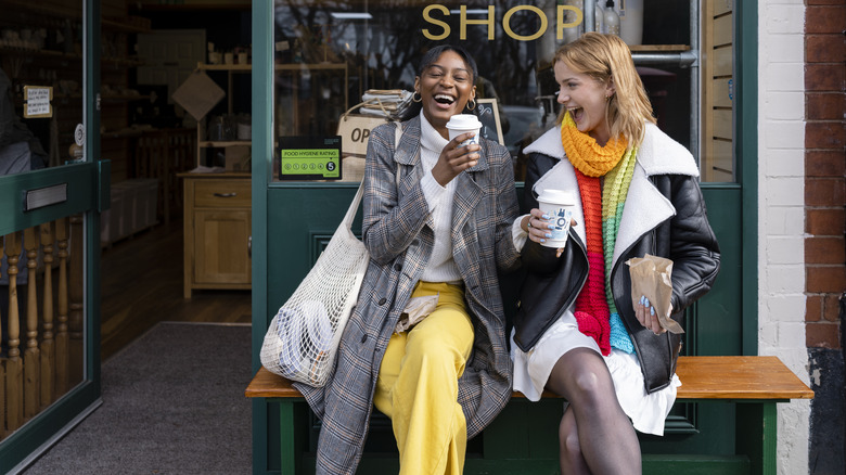 Two women laughing together