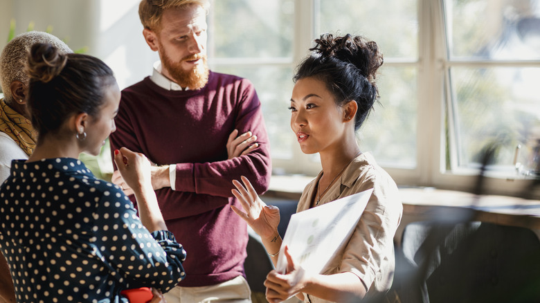 Woman presenting idea at work