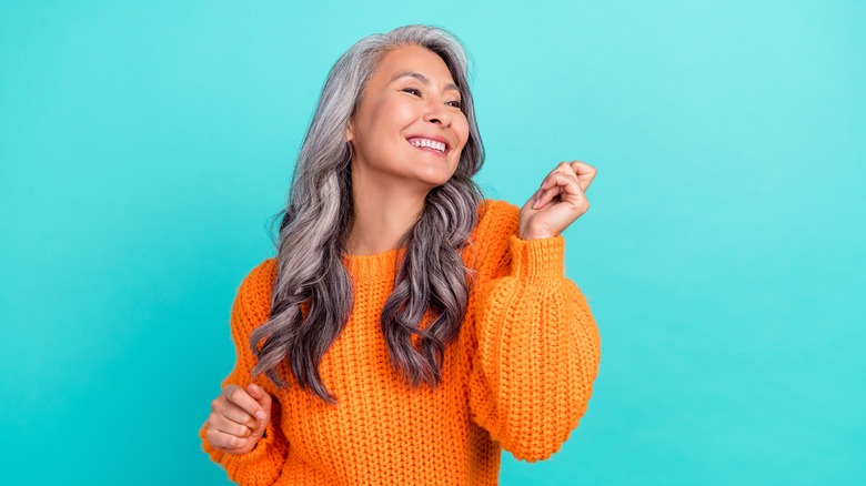 Woman with gray hair smiling