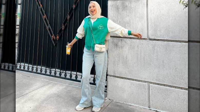 varsity jacket with jeans