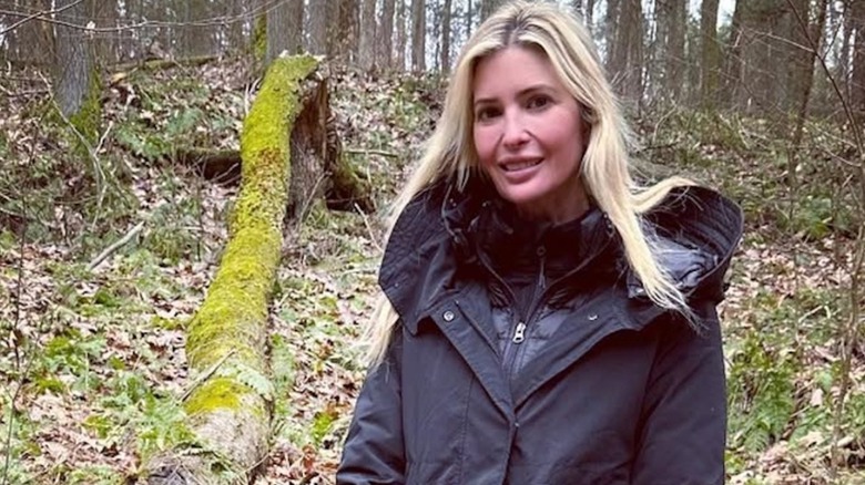 Ivanka Trump posing for a photo in the woods without any makeup